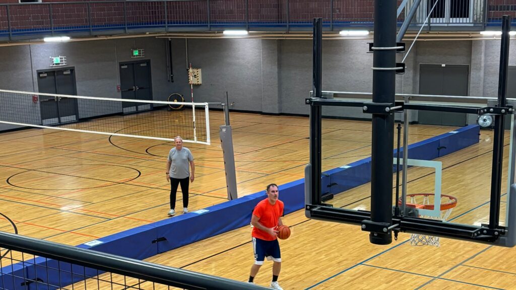 Basketball activity at Issaquah Community Center, viewed from the indoor track.